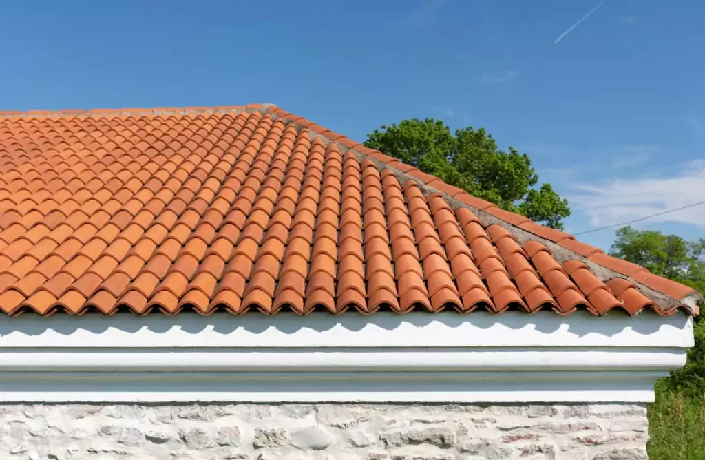 Worker Placing Roof Tiles From a Tile Manufacturer