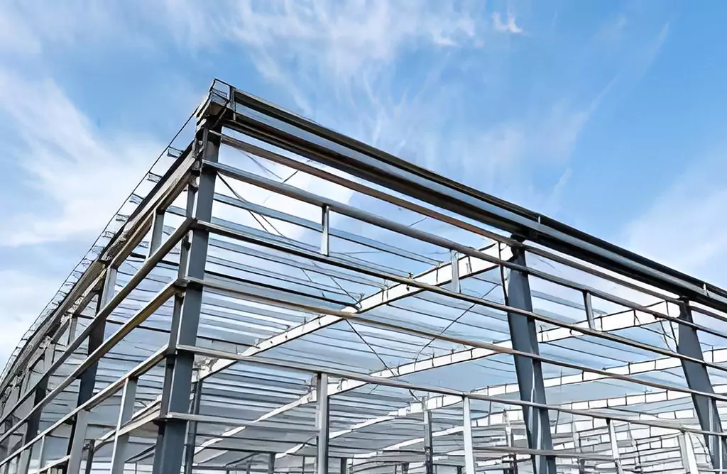 Steel Framework of an Industrial Building Against the Sky