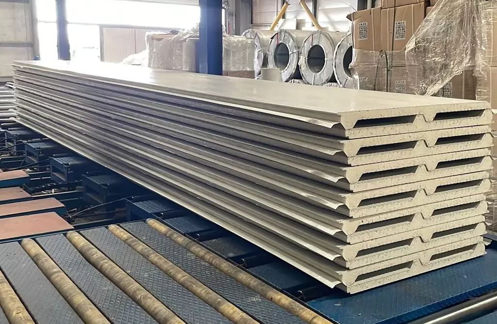 A Stack of Beige Drywall Sheets in a Factory