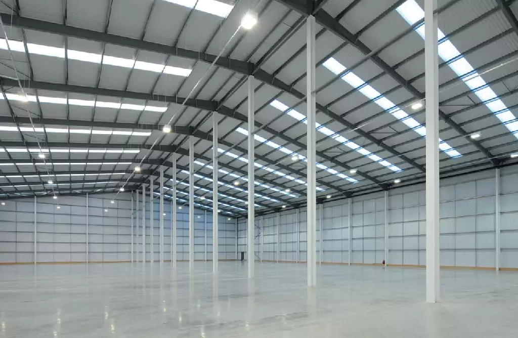 Large Empty Warehouse Interior with High Ceiling