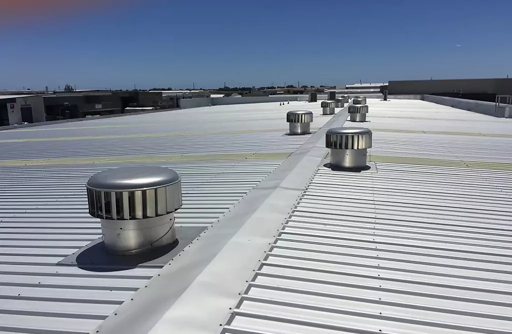 View of White Metal Roof with Vents